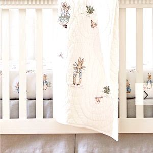 Pottery Barn Kids classic “Peter Rabbit” hand quilted child/crib blanket.